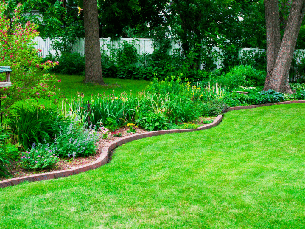 Naccarato Landscaping Gulf Coast shows a tidy, welcoming yard that looks comfortable, calm, and well-cared-for.